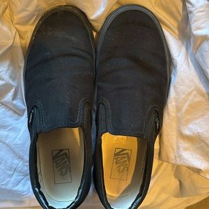 VANS black on black slip ons